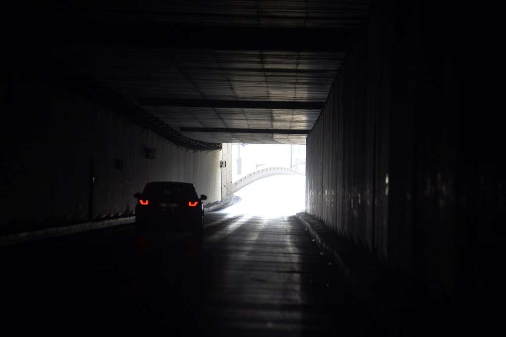 A car passes through a tunnel