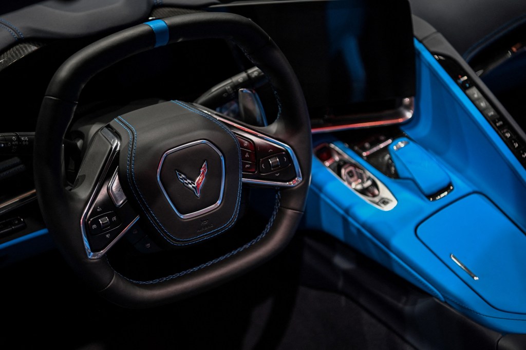 The blue leather interior of a 2020 Corvette at an auto show