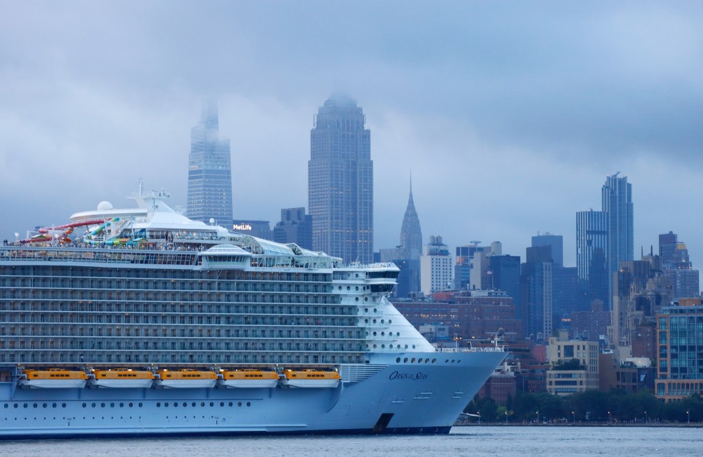 A Royal Caribbean cruise ship sails up the Hudson River in New York City