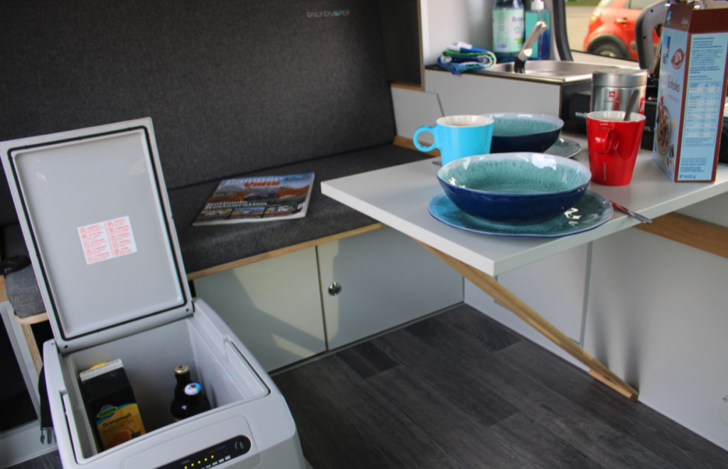counter and kitchenette in the most affordable camper van