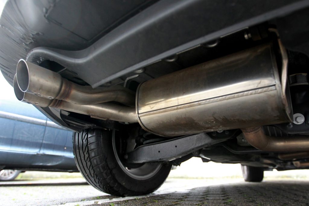 The exhaust pipe systems of a diesel car from Cologne, Germany