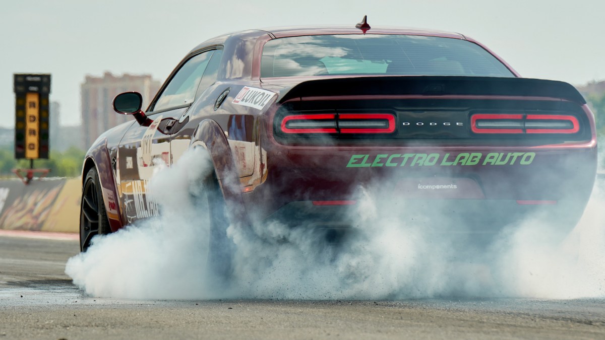 Dodge Challenger doing a burnout in Moscow