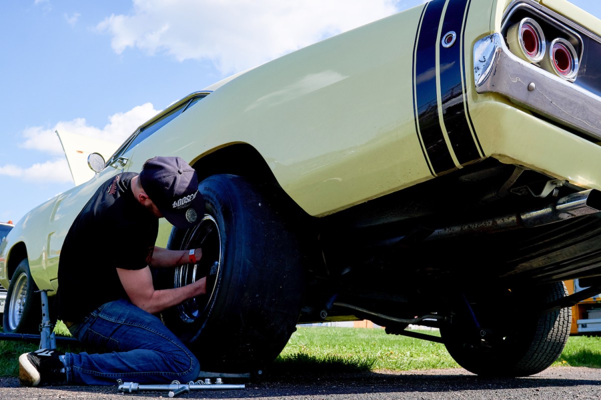 Mechanic working on Dodge Charger 