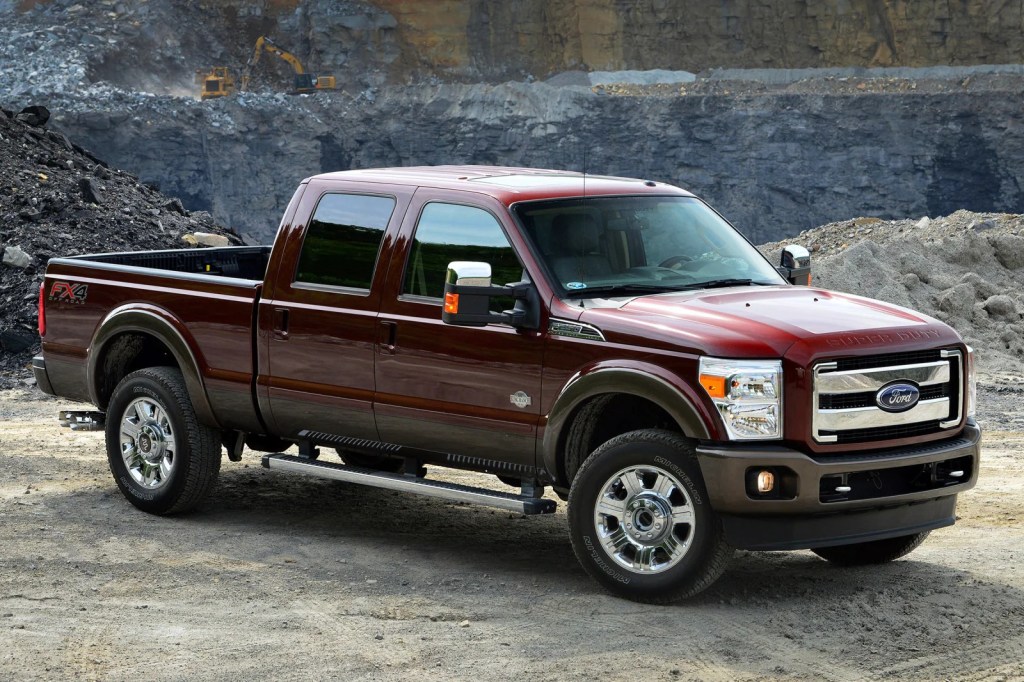 A brown 2015 F250 Super Duty parked on a cliff - one of the best used pick up trucks under $20,000