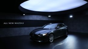 The AWD grey Mazda 3 at its launch a few years back, shot under a light box from the front 3/4