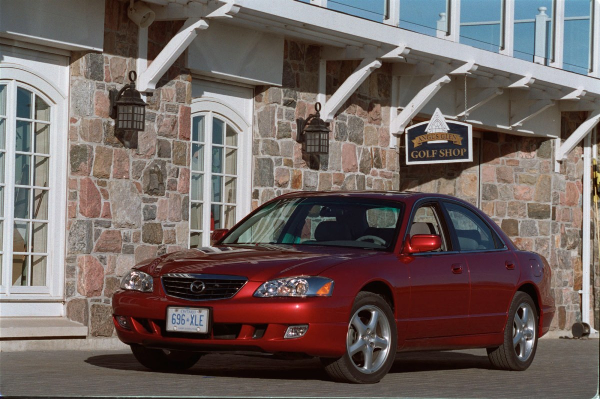 mazda millenia s parked outside