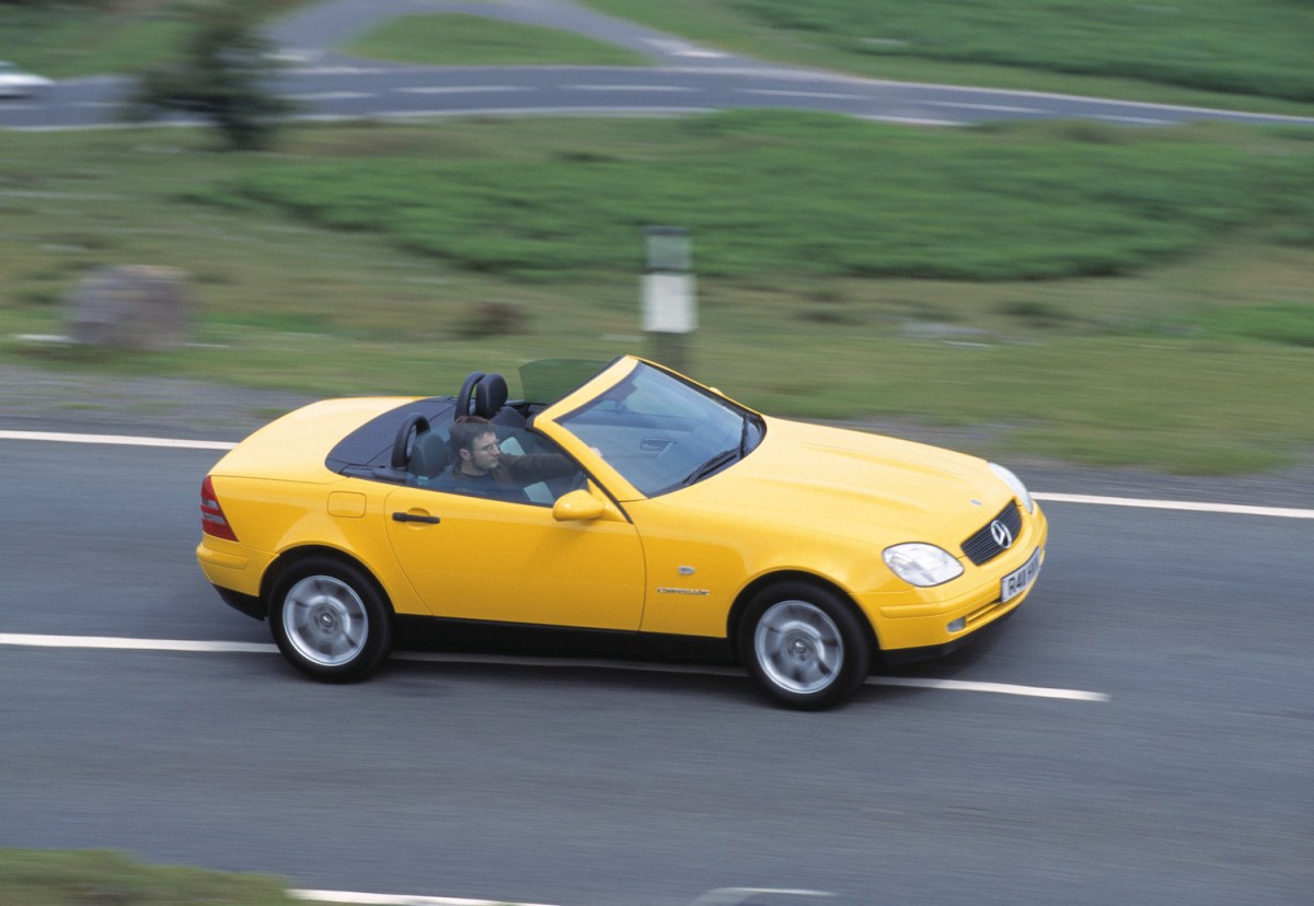 1998 Mercedes BenzSLK 230 driving down a road