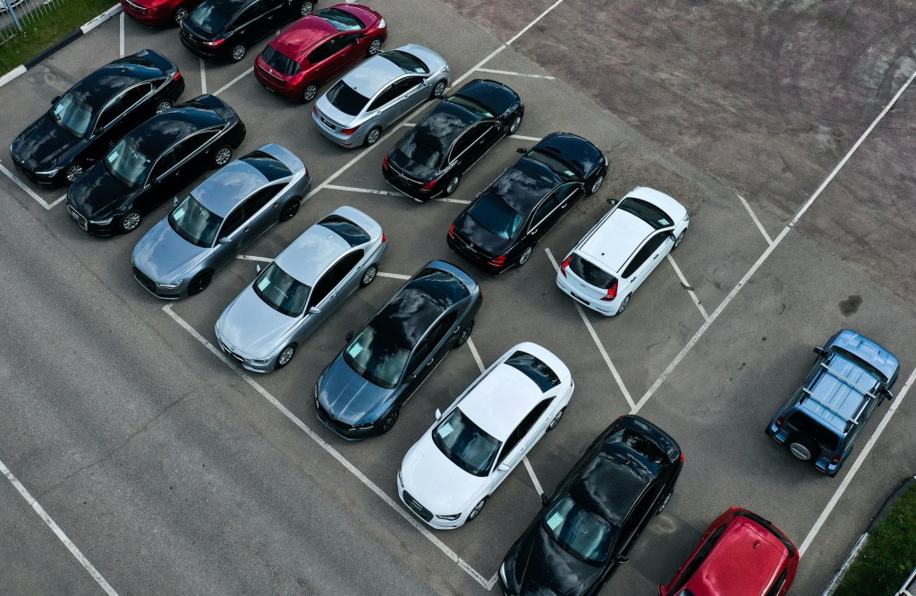 An aerial view of cars at the Fresh Auto car dealership. 