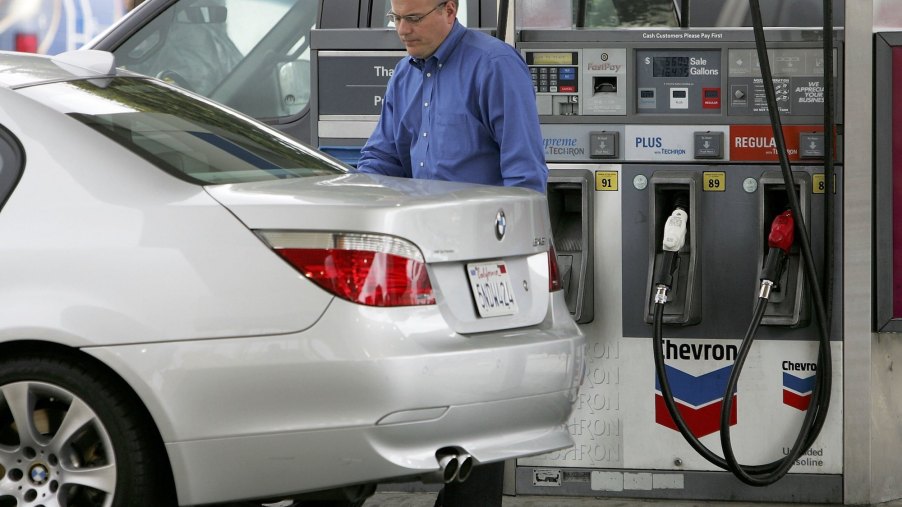A customer pumps premium gas into a BMW at a Chevron station in April 2006 in San Francisco