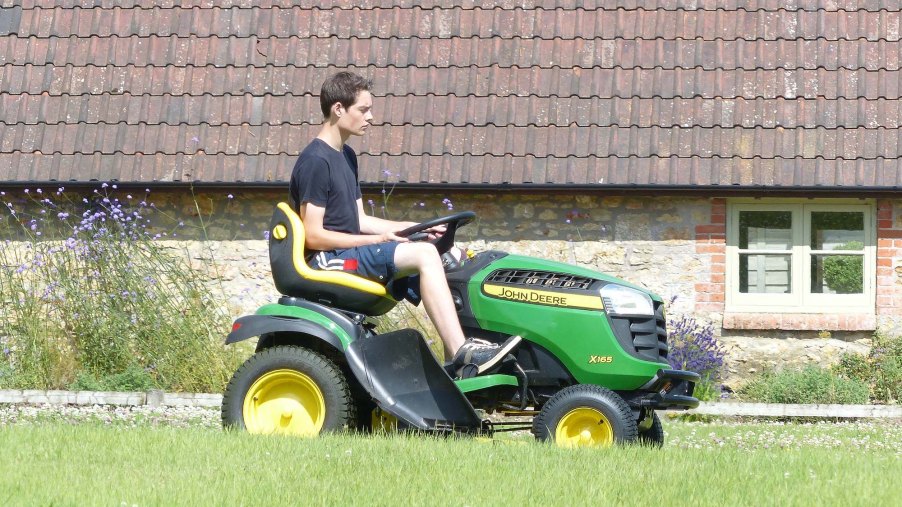 man on a riding lawn mower