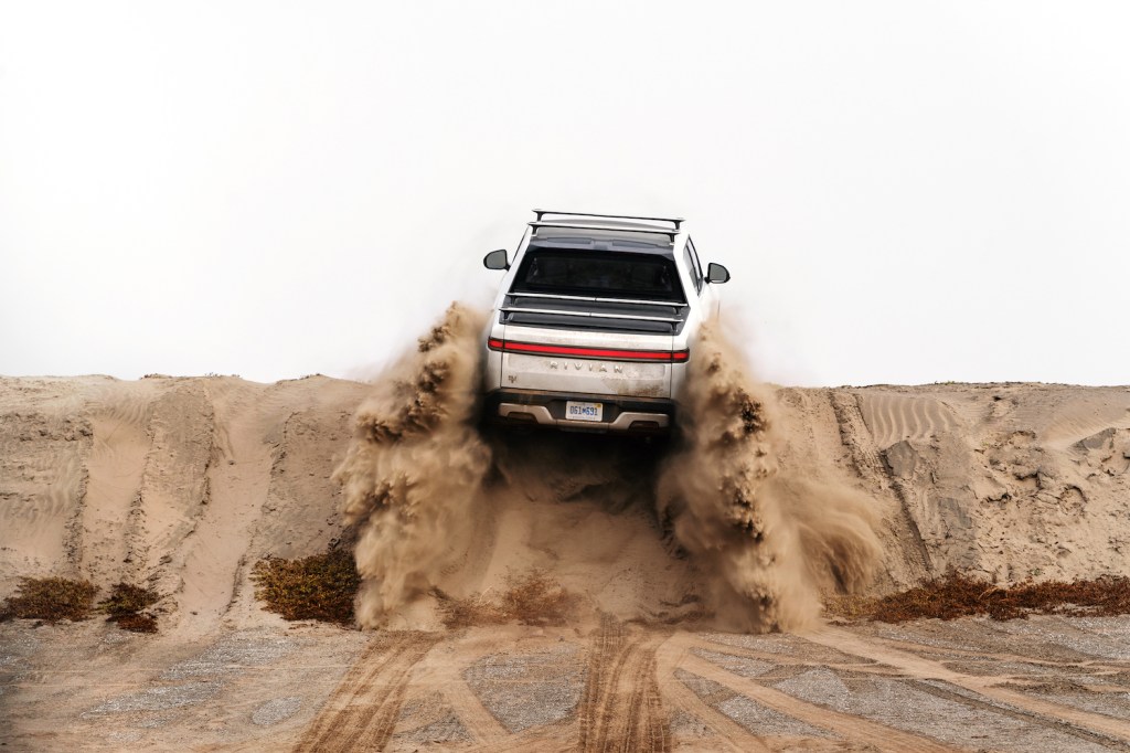 This is a press photo of a pre-production Rivian R1T off-roading. Watch Motor Trend's Rivian R1T Electric Truck Review.