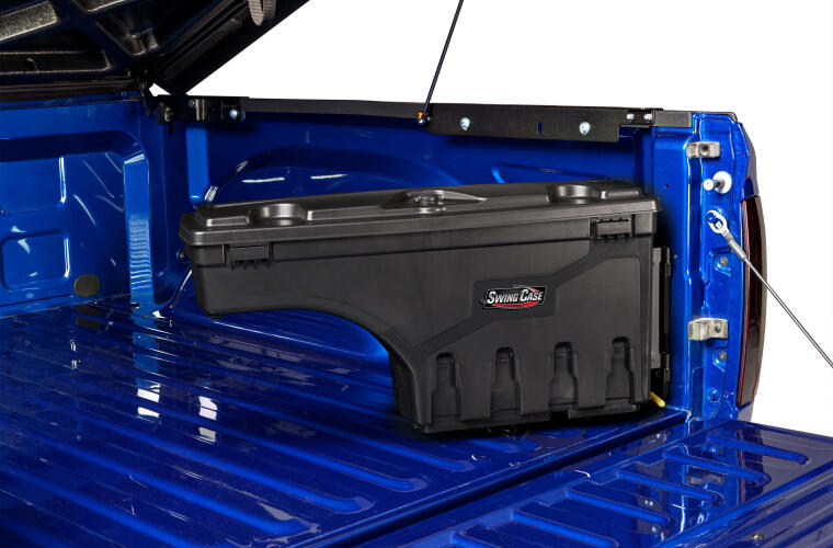 An undercover swingcase bed storage container inside the bed of an F-150