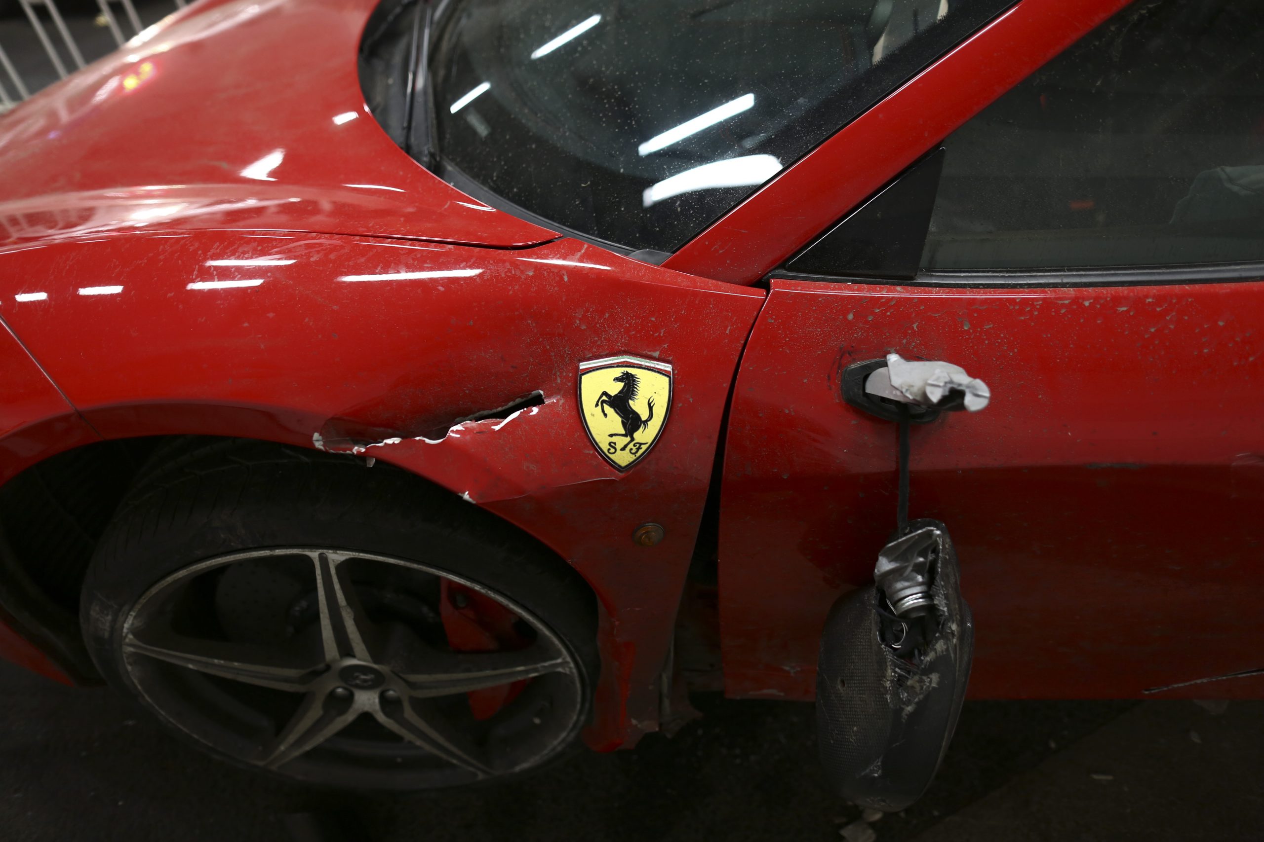 View of a damaged Ferrari after collision