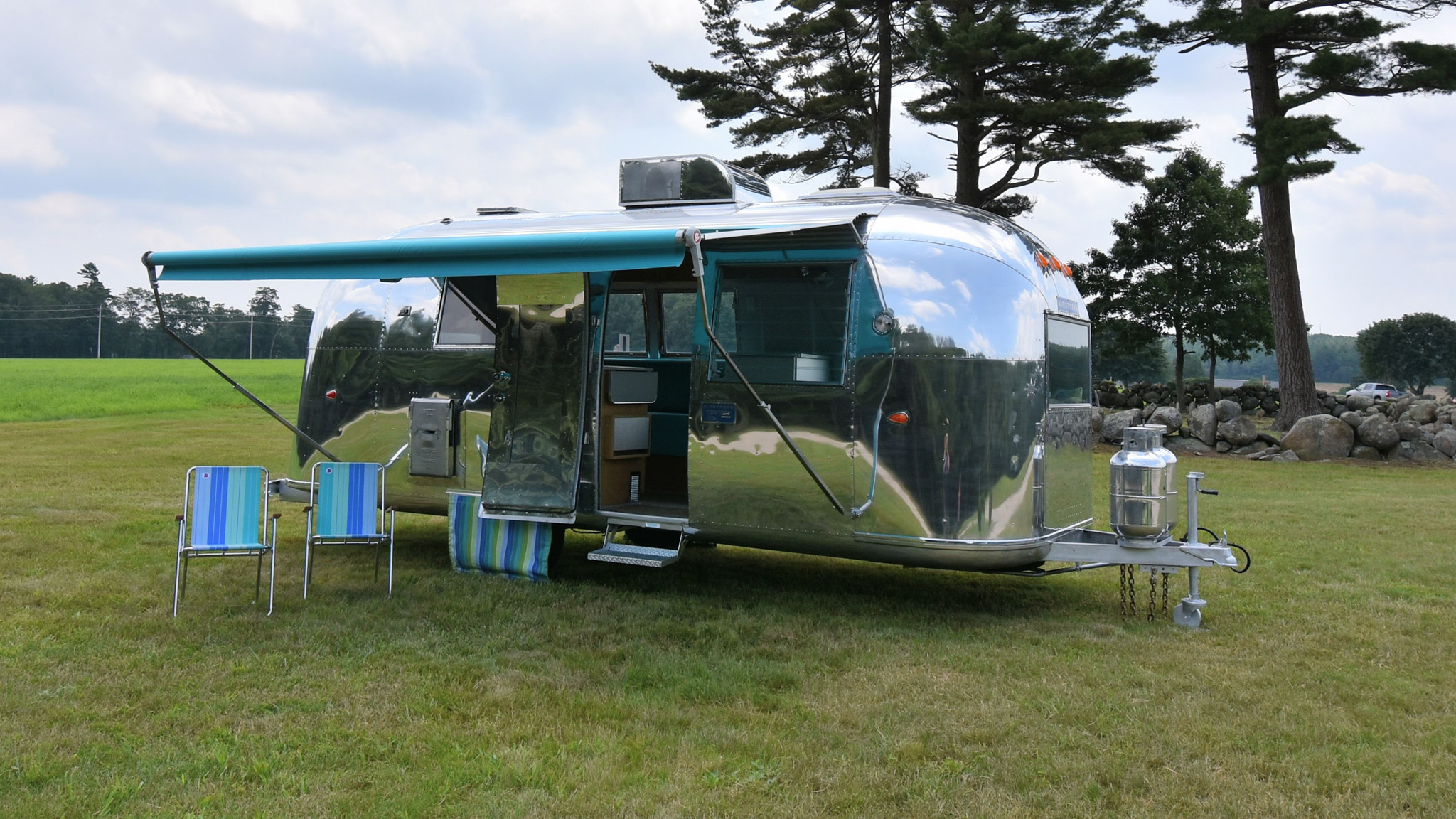 Vintage Airstream camper with awning up