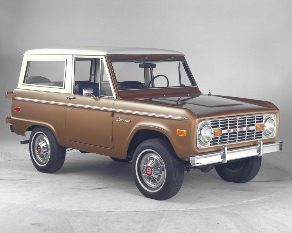 A brown-and-white 1974 Ford Bronco