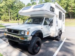 This Rare 1994 Toyota Hilux Overland Camper On Bring a Trailer Was Cheaper Than a 2022 Toyota Tacoma