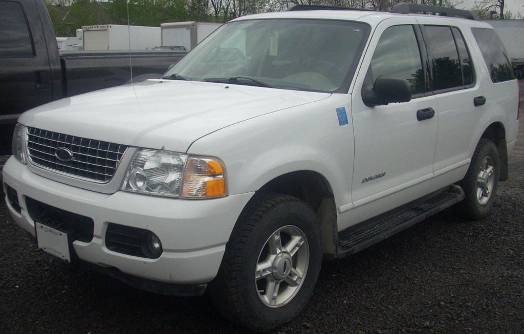 A white 2005 Ford Explorer parked in a parking lot