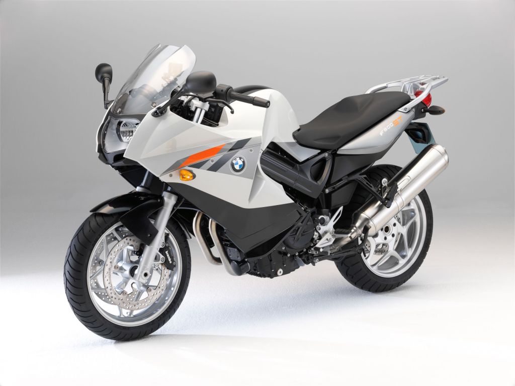 A silver-with-gray-and-orange stripes 2010 BMW F 800 ST sport-touring bike