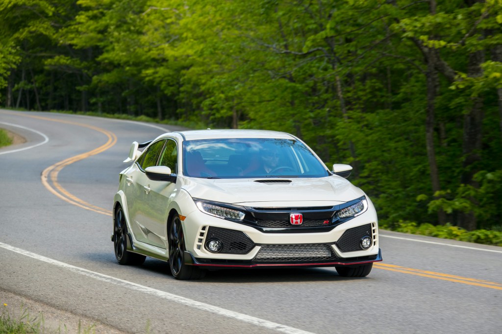 2017 Honda Civic Type R in championship white driving on a road