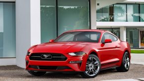 A red 2018 Ford Mustang shot from the front 3/4