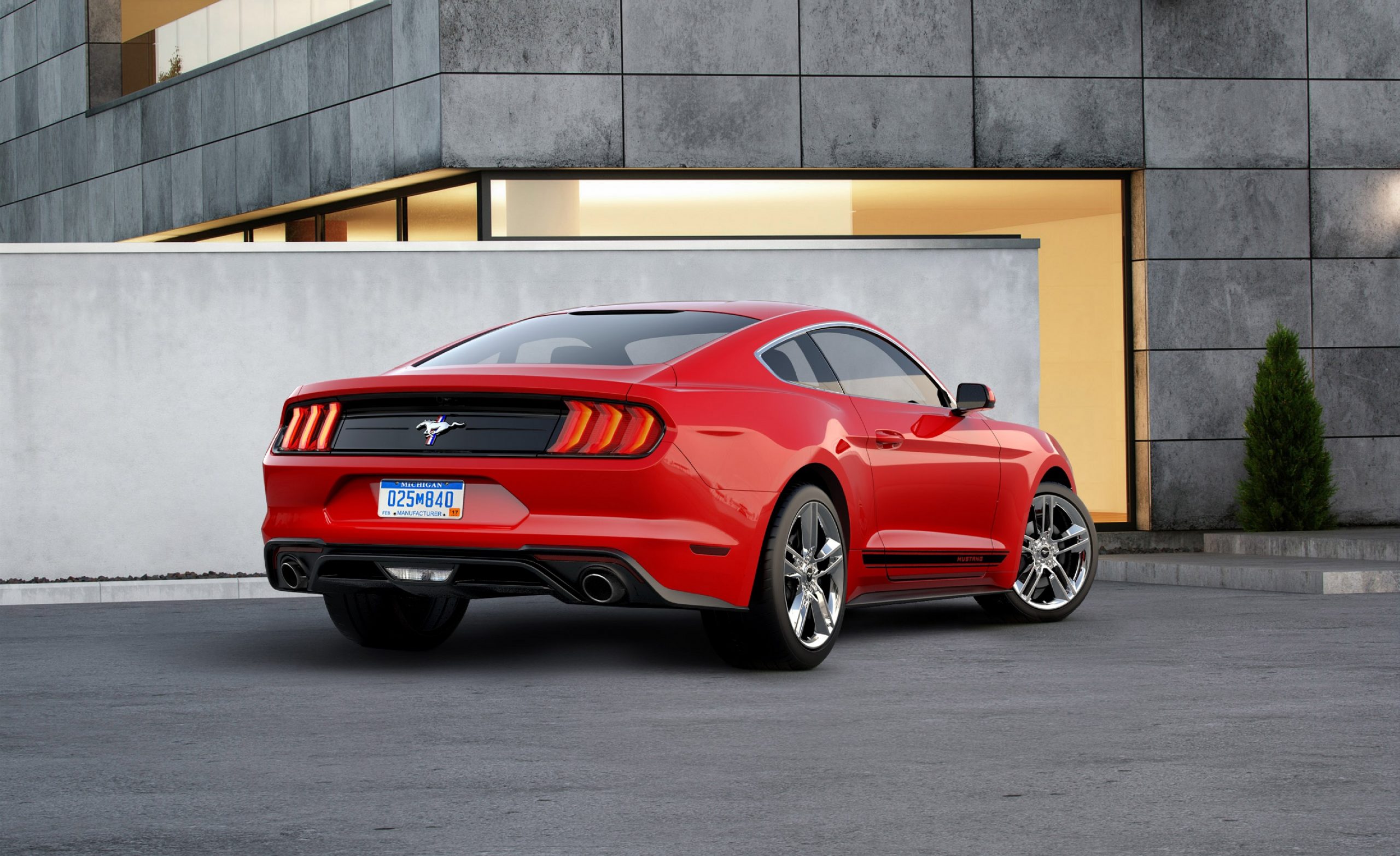 The rear 3/4 of a red Ford Mustang Pony Pack