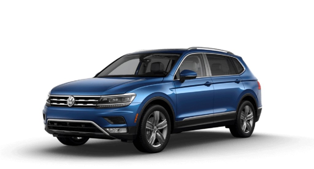 A blue 2021 Volkswagen Tiguan against a white background. 