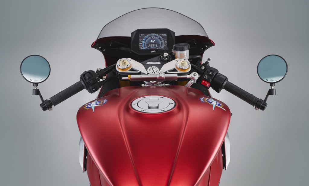 The handlebars, Ohlins steering damper, and TFT display on a red 2021 MV Agusta Superveloce Ago