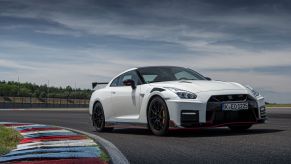 The 2021 Nissan GT-R Nismo supercar parked on a race track