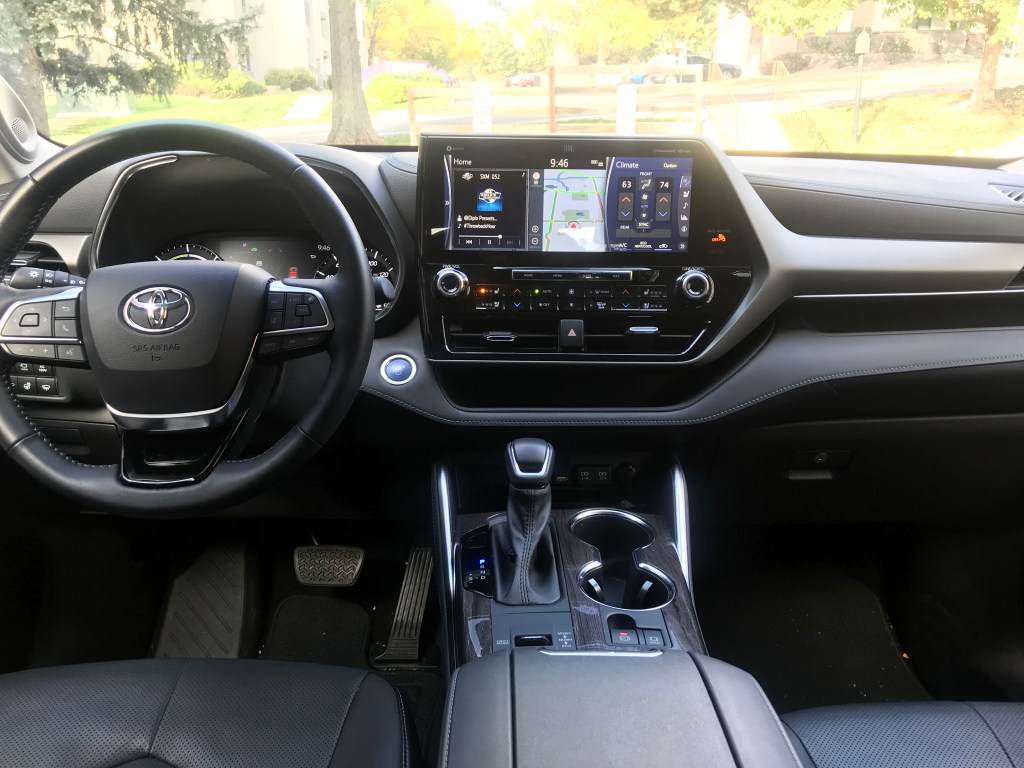 a front interior shot of the 2021 Toyota Highlander Hybrid