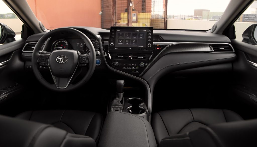 a black interior on the 2021 Toyota Camry Hybrid XSE 