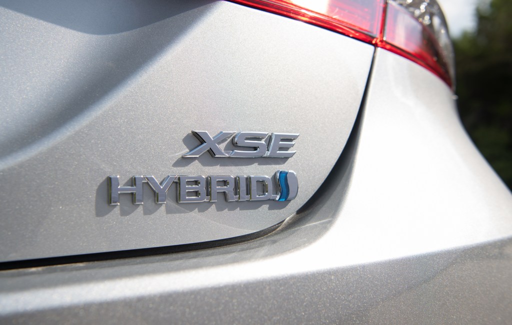 A photo of the Hybrid badging on the 2021 Toyota Camry Hybrid XSE