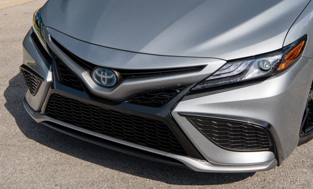 A close front shot of the 2021 Toyota Camry Hybrid XSE