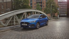 A blue 2022 Ford Focus on a ridgeb