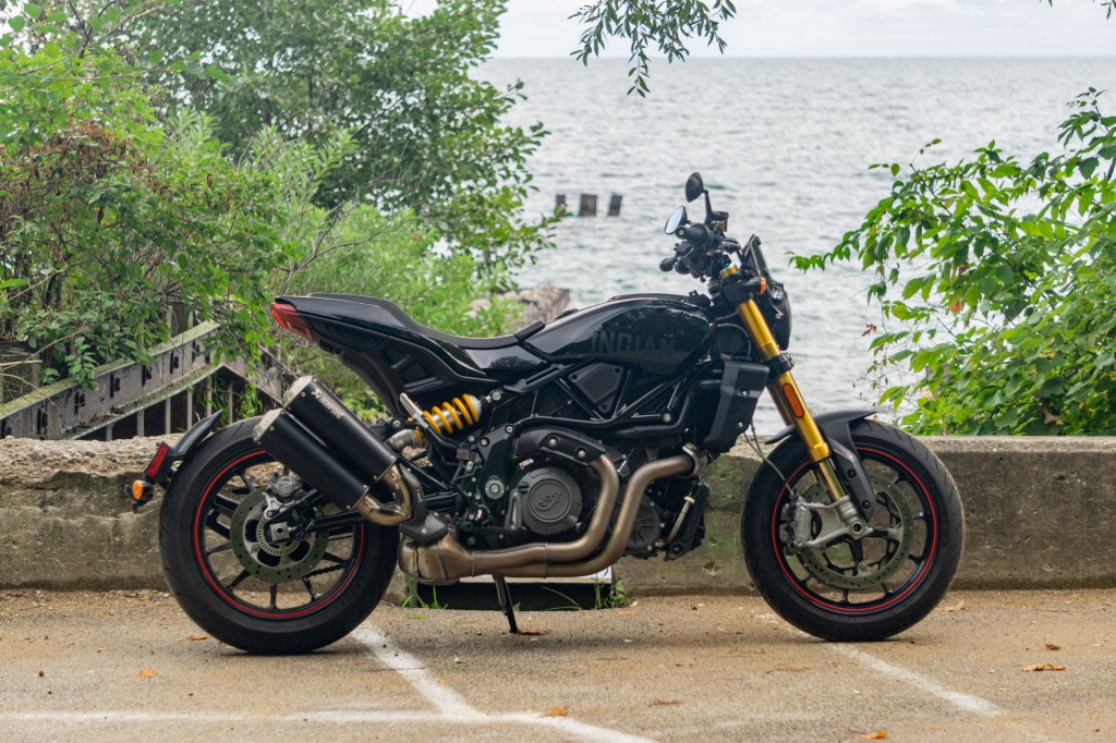 The right-side view of an accessorized black 2022 Indian FTR S in a Lake Michigan parking lot