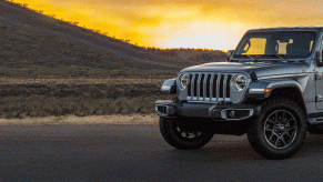 A gray 2022 Jeep Gladiator against a sunset.