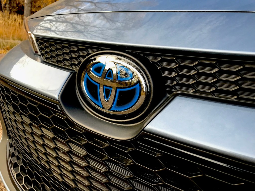 a close up shot of the 2022 Toyota Corolla Hybrid's emblem