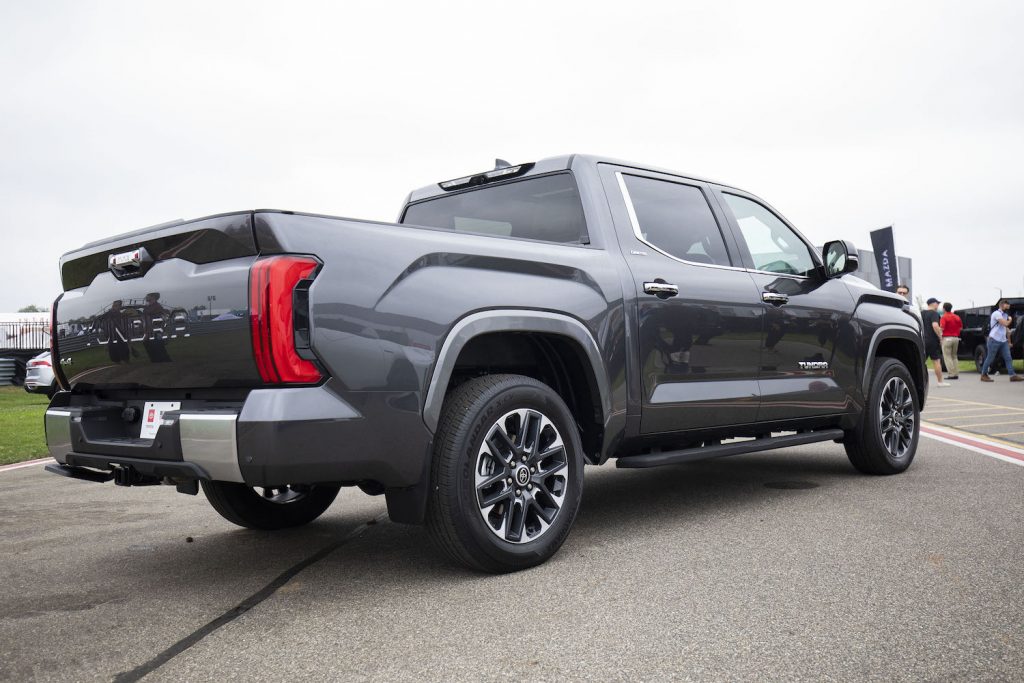 This is a photo of a gray 2022 Toyota Tundra pickup truck with a iForce MAX hybrid drivetrain, shared by a 2022 Toyota Tundra Capstone, at a test event. | Bill Pugliano/Getty Images