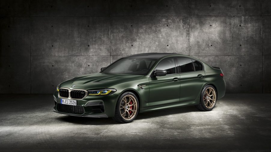 The matte green 2022 BMW M5 CS shot from the front 3/4