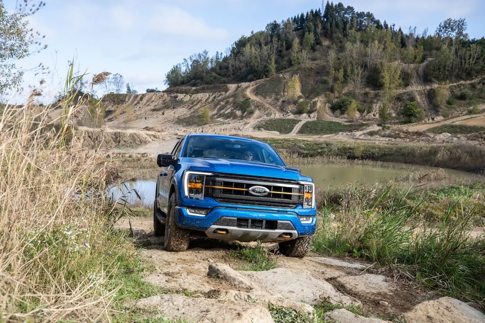 The 2022 ford F-150 Tremor off-roading in the dirt