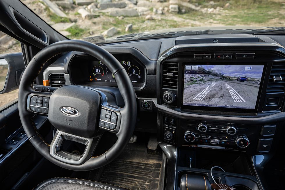 The Ford F-150 Tremor has a switch for four-wheel auto by the driver's knee.  