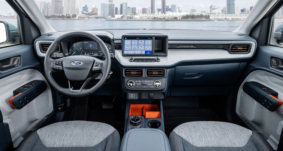 A gray 2022 Ford Maverick XLT interior with a city background, what's the price of a fully loaded version?