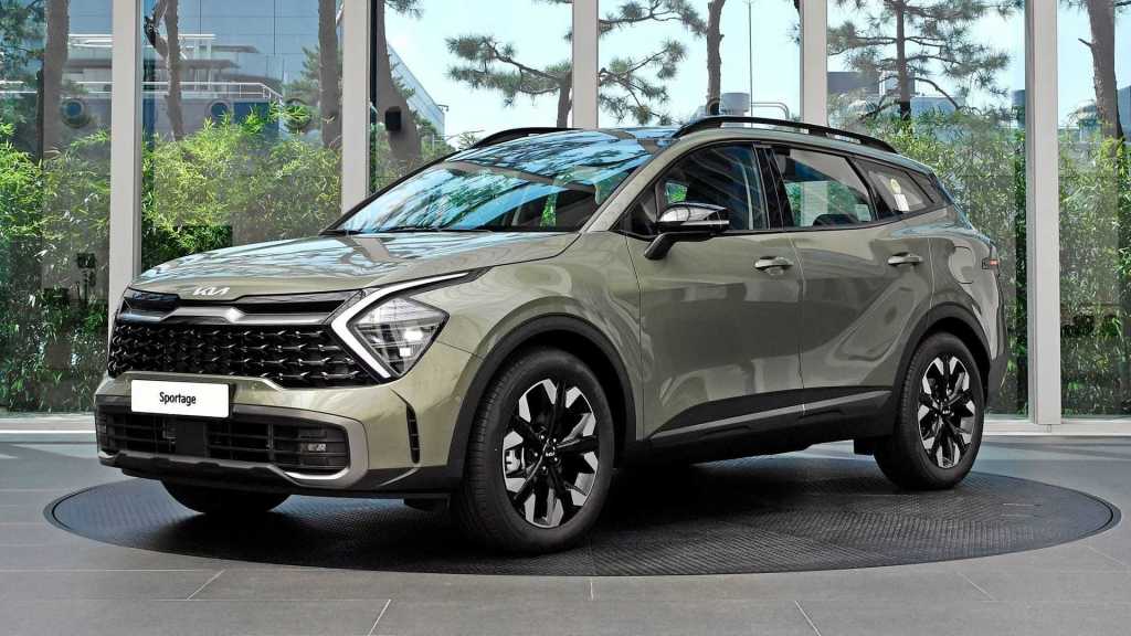 The 2023 Kia Sportage on display in a showroom, its new X-Pro off-road trim will compete with vehicles like the Subaru Forester Wilderness