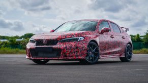 The camo liveried 2023 Honda Civic Type R shot from the front 3/4 at the Nurburgring