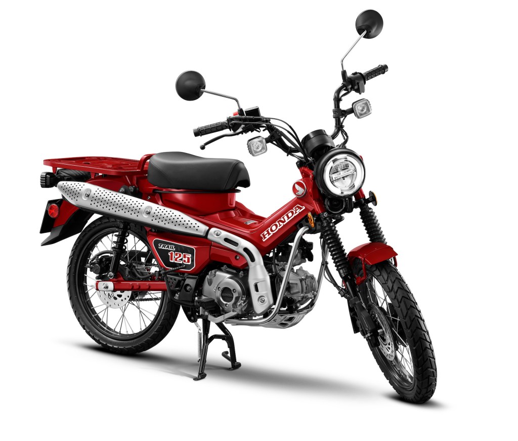 A red 2021 Honda Trail 125 ABS