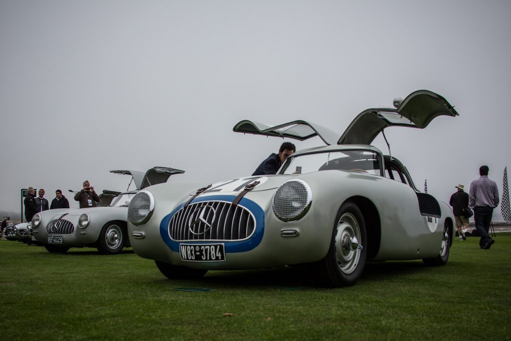 A line of silver Mercedes 300 SL 'W 194' race cars