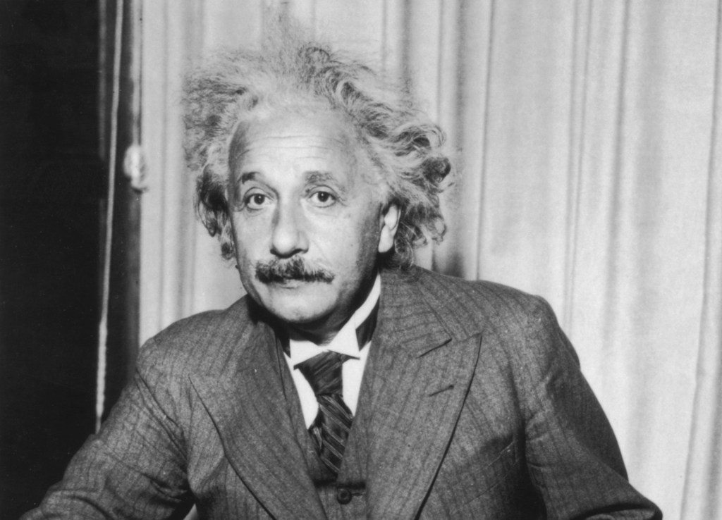 Albert Einstein in a suit and tie
