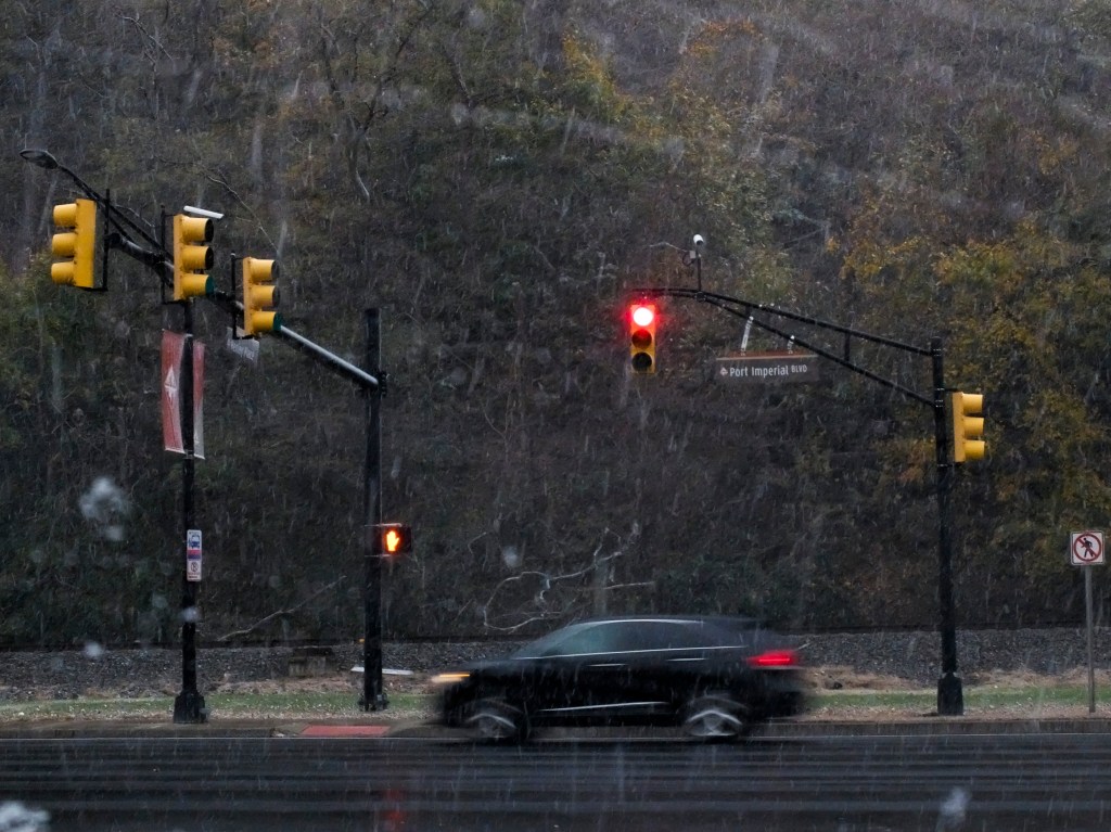 Car Driving Through Rain
