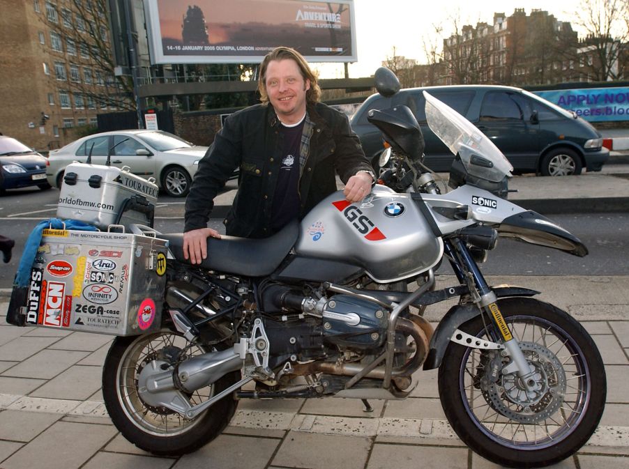 Charley Boorman with his silver "Long Way Round" BMW R 1150 GS Adventure motorcycle
