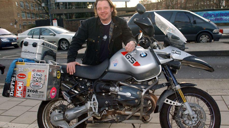 Charley Boorman with his silver "Long Way Round" BMW R 1150 GS Adventure motorcycle