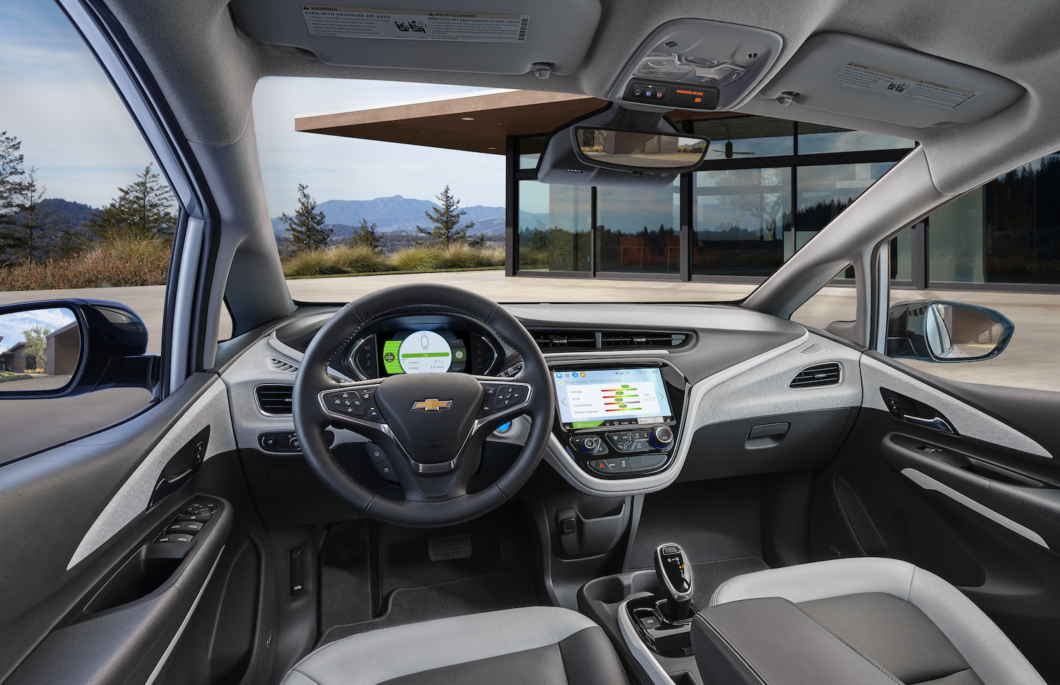 This is a promo photo of the interior of a 2020 Chevrolet Bolt. The floor mats in some cars are interfering with the pedals, causing unintended acceleration, and leading to a Chevy Bolt recall. | General Motors